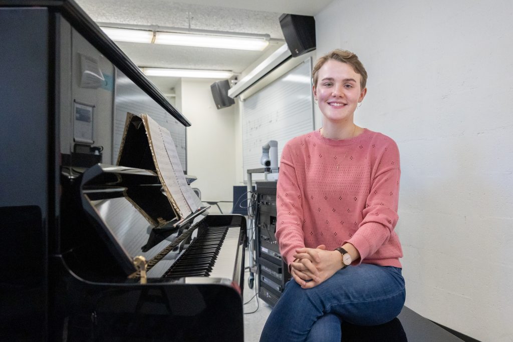 Sarah Marze, a recipient of the 2023 Marshall Scholarship, poses for a photo in the Fine Arts Complex