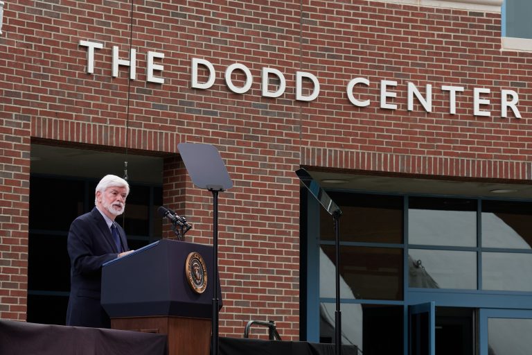 Former Senator Christopher J. Dodd speaks during the dedication ceremony of The Dodd Center for Human Rights at the University of Connecticut main campus in Storrs