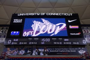 The video board in Gampel Pavilion displays graphics designed by DMD students working in Athletics. 