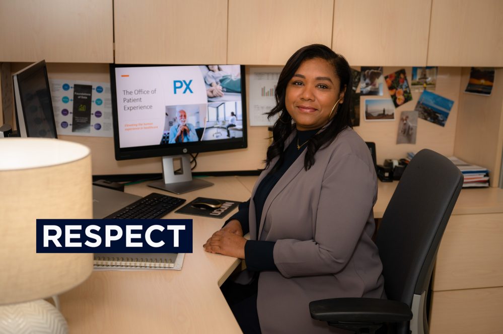 Tamara Cardoso at desk with "Respect" banner superimposed on photo