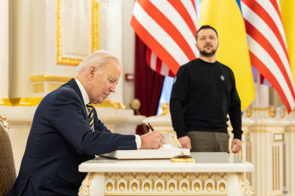 In this handout photo issued by the Ukrainian Presidential Press Office, U.S. President Joe Biden signs the guest book during a meeting with Ukrainian President Volodymyr Zelensky at the Ukrainian presidential palace on February 20, 2023 in Kyiv, Ukraine. The US President made his first visit to Kyiv since Russia's large-scale invasion last February 24.