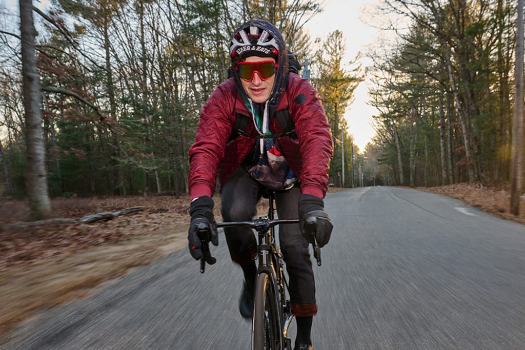 Ph.D. student and pro cyclist Geno Villafano biking outside