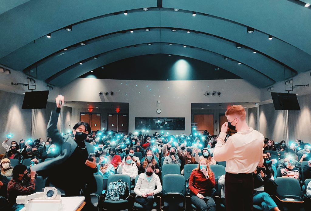 Richmond Le (left) and Joe Stone, co-presidents of UConn's Club (Taylor) Swift fire up the crowd of Swifties at a previous meeting. On Wednesday, the group will invite business professor Sami Ghaddar in to discuss how Swift's brilliant business strategies have contributed to her meteoric success. All are welcome to attend.