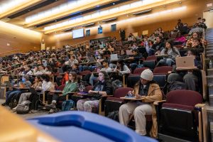 UConn students sit through a lecture in 102 McHugh Hall on the first day of classes for the Spring 2023 semester on Jan. 17, 2023. 