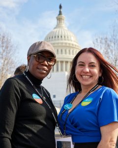 Jessica Parmelee and Tracy Thomas, U.S. Capitol building in background