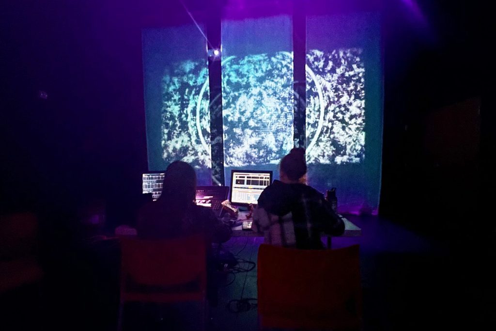 Noah Ciccimarro ’25 (SFA), left, and Lizi Shaul ’23 (SFA, CLAS) fine tune projections for their show, "Synesthesia," which will be performed Friday, Saturday, and Sunday at the Ballard Institute and Museum of Puppetry.