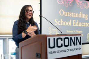Kristen N. Negrón gives remarks at the podium.