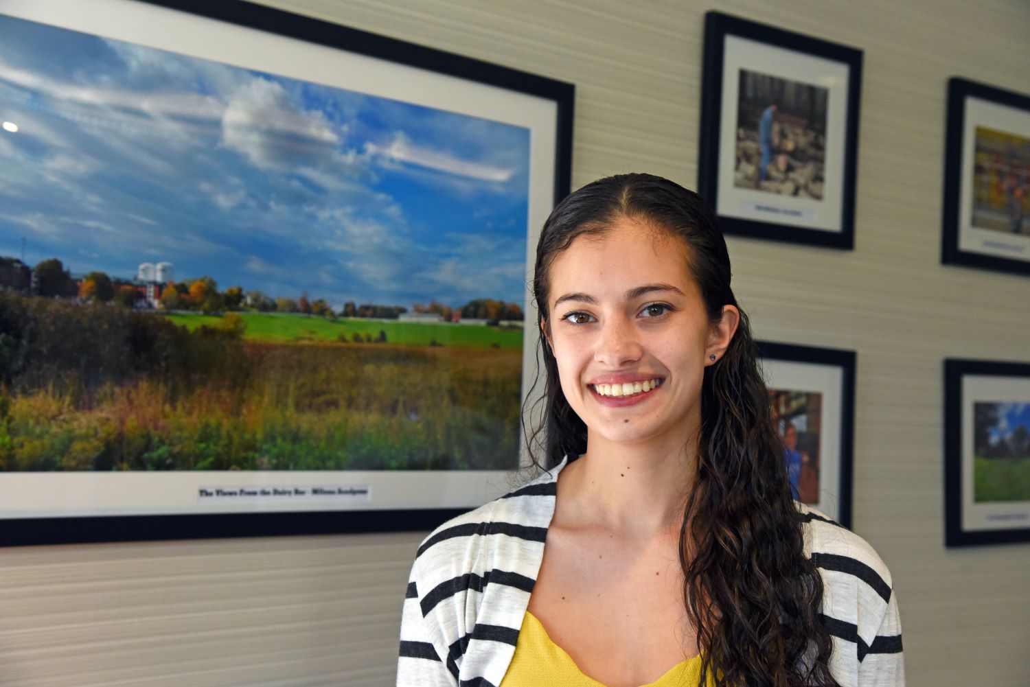 Amealia Maynard ‘23 (CAHNR), a major in applied and resource economics in the Department of Agricultural and Resource Economics in the College of Agriculture, Health and Natural Resources, poses for a portrait for Commencement 2023 in the Wilfred B. Young Building (YNG). Apr. 10, 2023. (Jason Sheldon/UConn Photo)