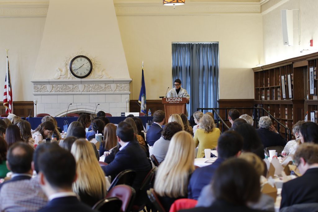 Keynote Speaker NYU Law Professor Melissa Murray speaks in front of a large audience.