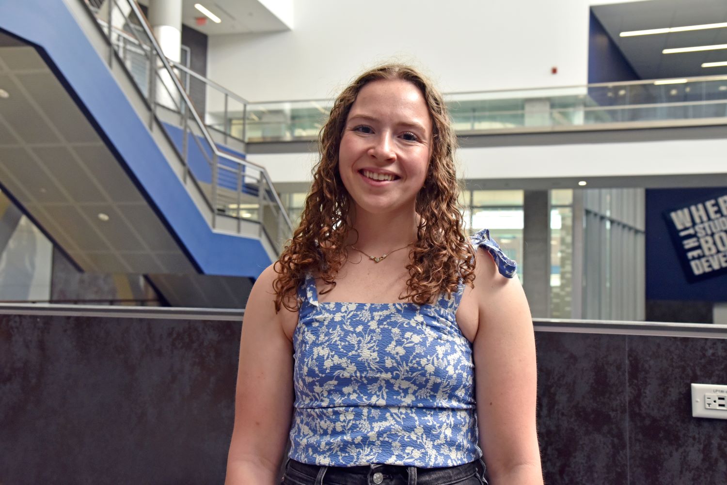 Catherine Mydosh ‘23 (CAHNR), a major in exercise science in the Department of Kinesiology in the College of Agriculture, Health and Natural Resources, poses for a portrait for Commencement 2023 inside the Student Recreation Center (SRC). Apr. 12, 2023. (Jason Sheldon/UConn Photo)