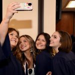 Graduates take a selfie