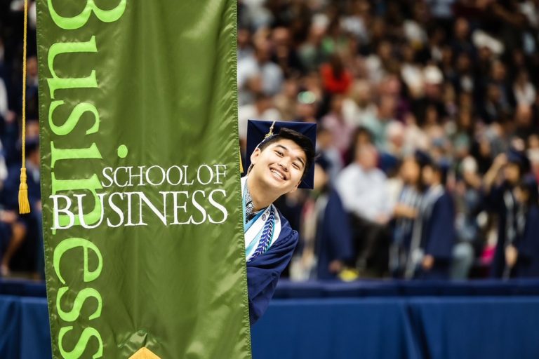 Richmond Le '23, part of the healthcare management program, during the School of Business commencement ceremony on 5/6. (Nathan Oldham / UConn School of Business)