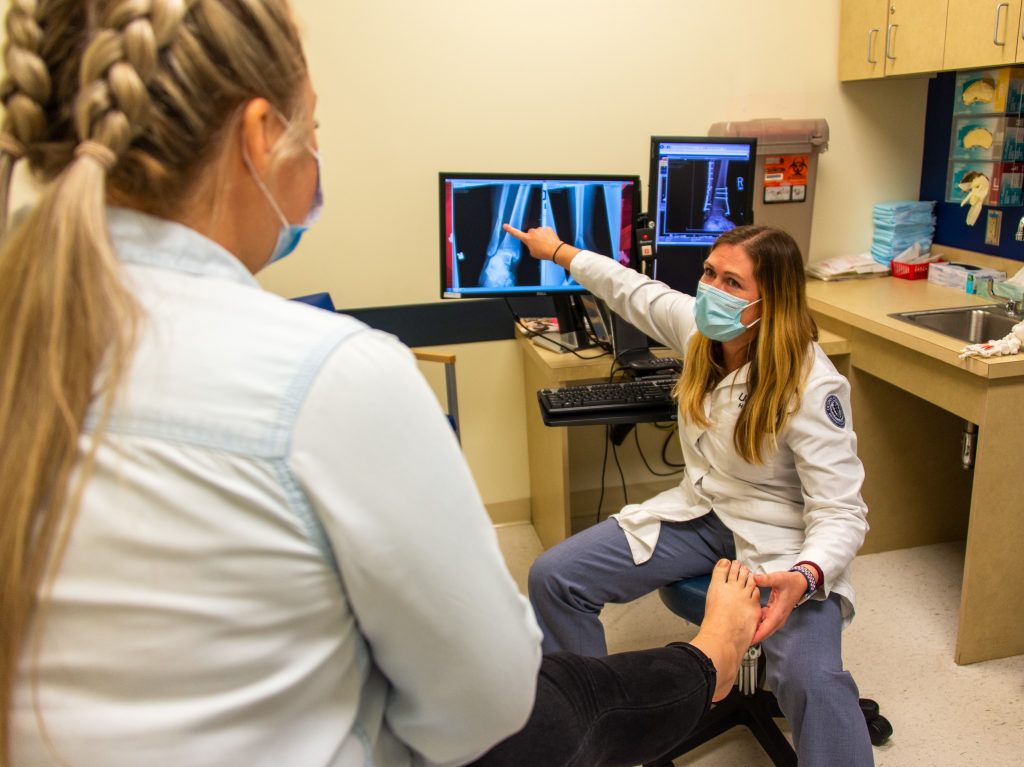 Lauren Geaney, MD, a foot and ankle surgeon is one of the 36 UConn Health physicians named to the 2023 'Top Doctors' list published by Connecticut Magazine (Tina Encarnacion/UConn Health photo).