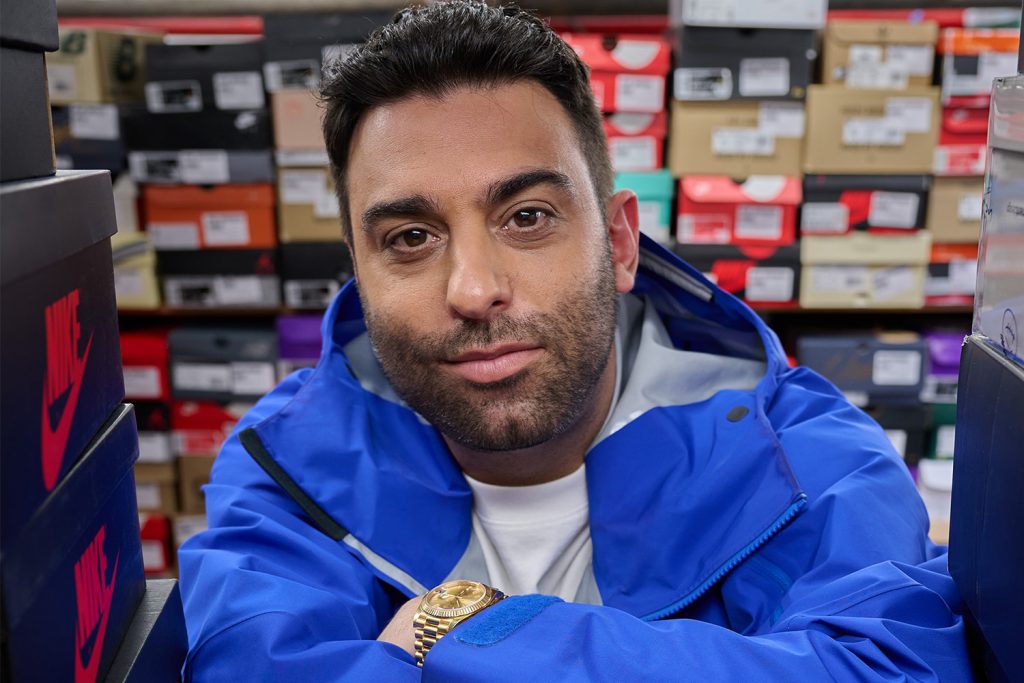 Joe La Puma hanging out with his sneaker collection