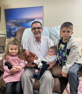 Mr. Medolli with this four grandchildren. 