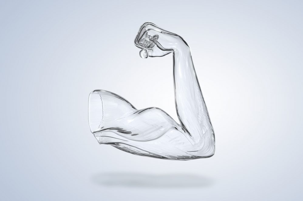 A muscular arm made of glass, flexing.