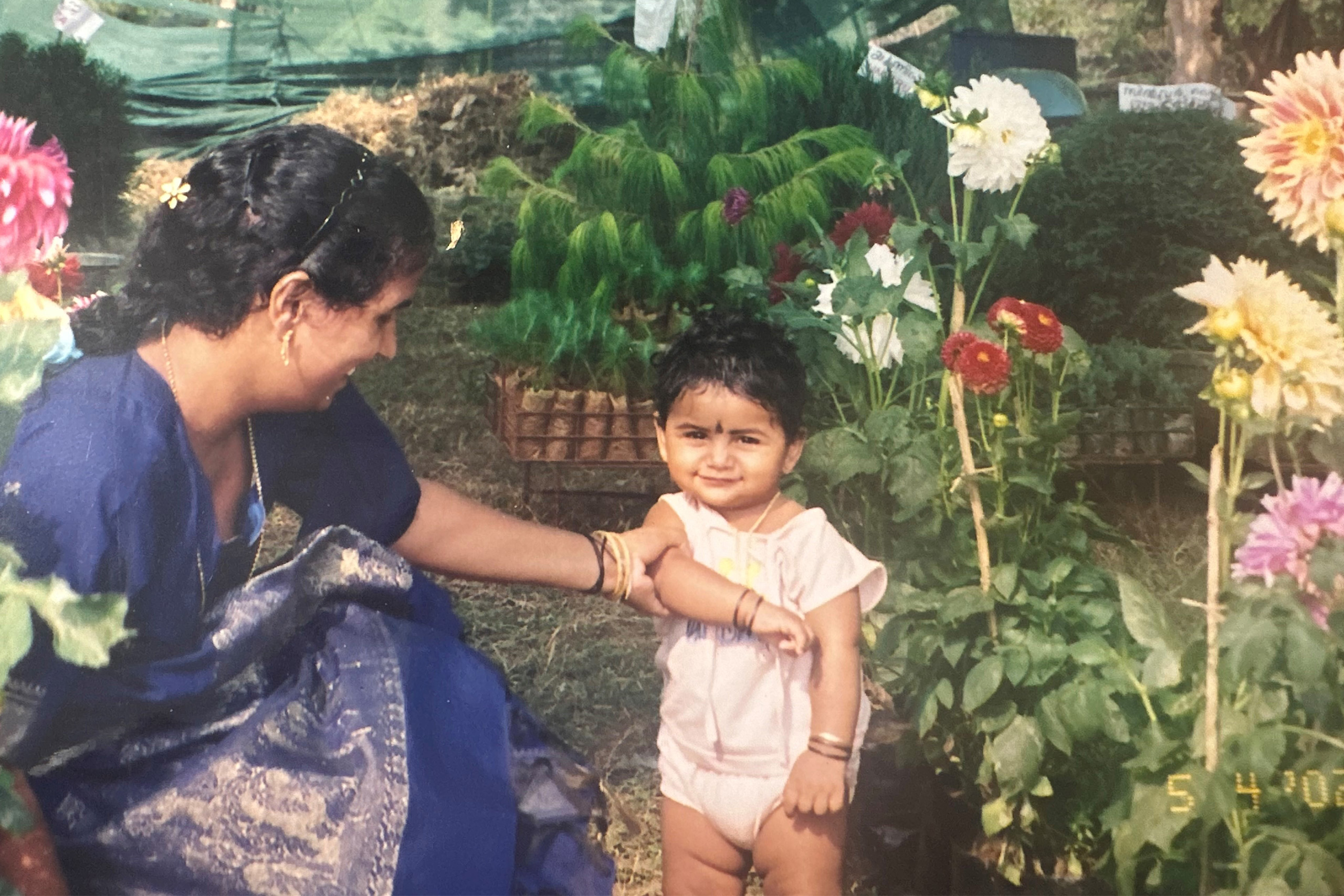 Jithu with his mother in India when he was a baby.