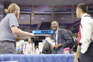 UConn students meet with potential employers during the all-university career fair in Gampel Pavilion on Sept. 19, 2023. 