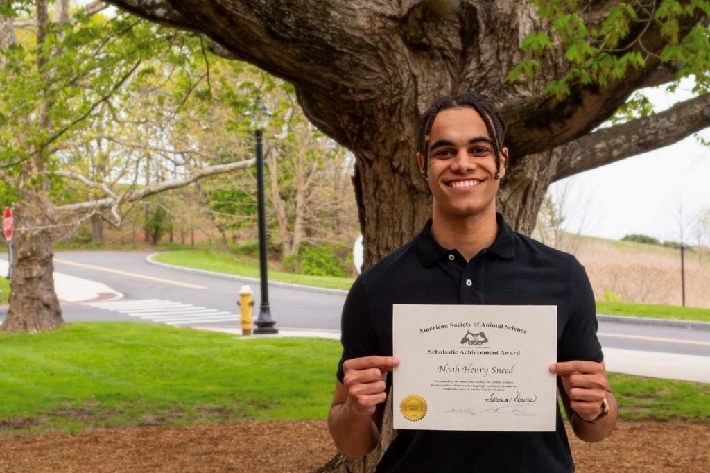 Man holding certificate