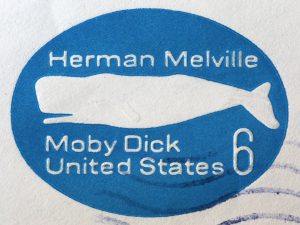 A canceled postmark showing the image of the whale Moby Dick.