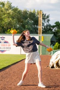 Senior Madison “Maddie’’ Hill ’24 (BUS) spent her second summer with the New Britain Bees organization. “Our players play so hard at every game and they cheer each other on. It’s just a great environment,’’ says Hill, who wants to become general manager of a professional sports team. (contributed photo)