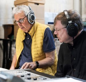 Producer Brian Pidgeon and UConn music composition professor Kenneth Fuchs at the recording console at St. Augustine’s Church in Kilburn, London. 
