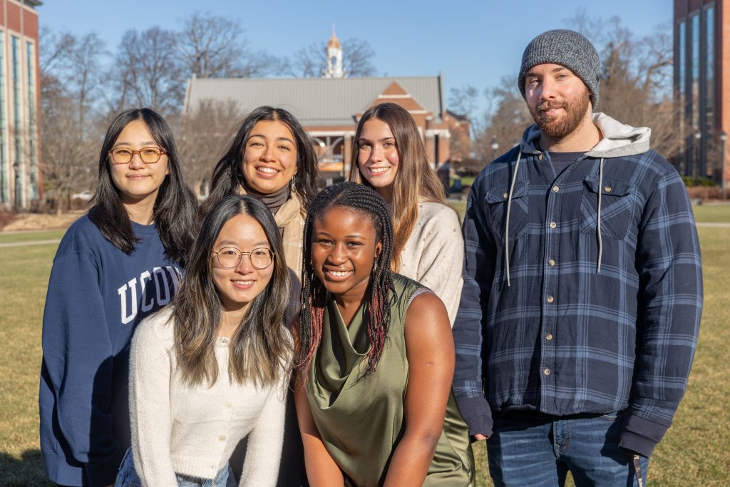 The fall 2023 recipients of Gilman scholarships (front, from left) Suki Zheng, Michelle Eweka, (back, from left) Moera Kamimura, Alexandra Torres Munoz, Avery Lyn Sparks and Yanni Tsiranides pose for a photo on the Student Union lawn