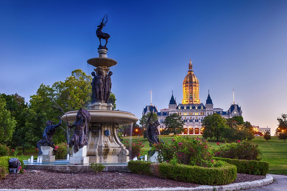 The Connecticut State Capitol building with the Corning Fountain in the foreground. The fountain was dedicated in 1899.