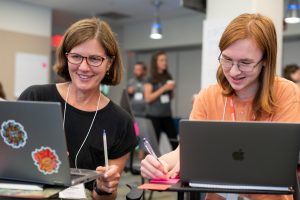 Darcie Hudson (left), a math teacher in West Hartford, and Jane Pauley-DeLapp, a senior at E.O. Smith High School in Mansfield, during the Human Rights Close to Home Summer Institute in Storrs.