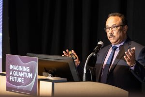 International quantum-computing expert Rajeeb Hazra delivers the keynote address at the event in Hartford.