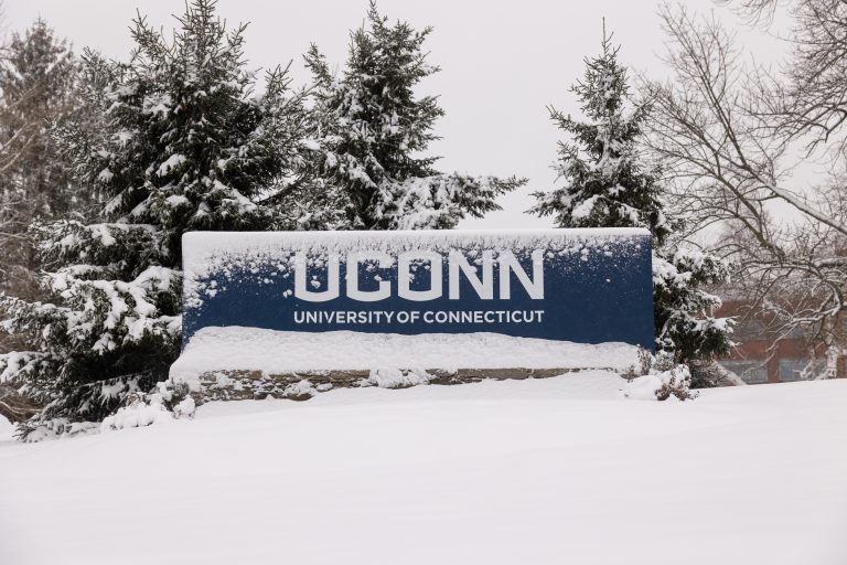 Snow falls across the UConn Storrs campus during the first snowstorm of the season