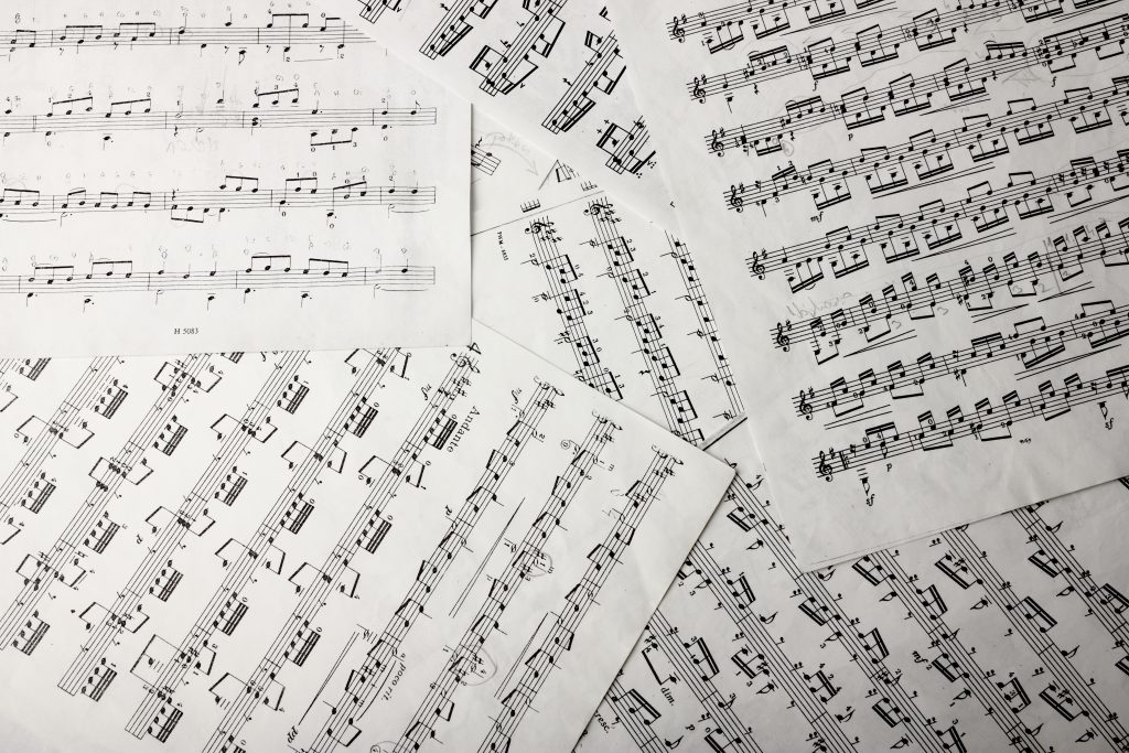 View of music notes on paper sheets.
