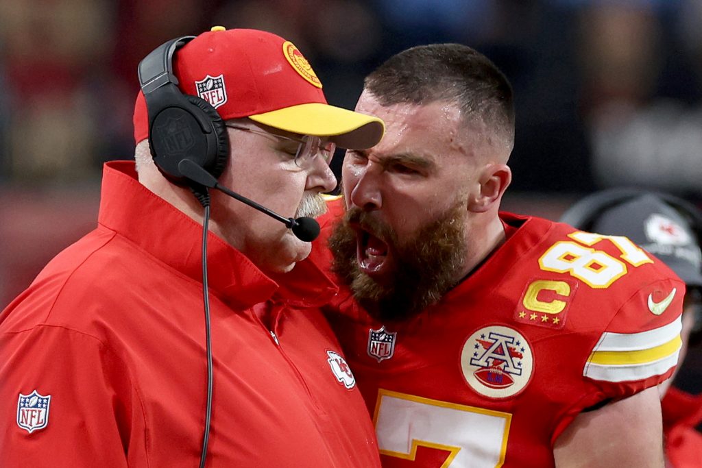 Travis Kelce #87 of the Kansas City Chiefs reacts at Head coach Andy Reid in the first half against the San Francisco 49ers during Super Bowl LVIII at Allegiant Stadium on February 11, 2024 in Las Vegas, Nevada.