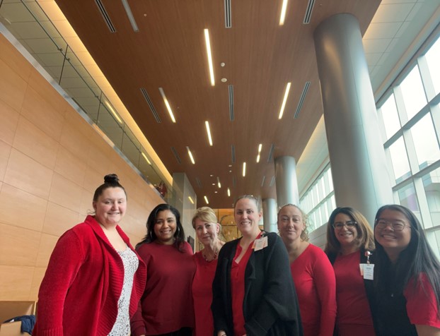 The Patient Experience Team of UConn Health wearing red.