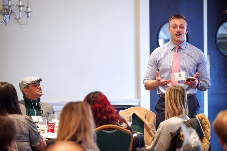Taylor Vander Laan, a social worker from Grand Rapids Mich., practices sharing his story during the Humphreys Institute for Political Social Work campaign school for social workers at the Hartford Club on Feb. 23, 2024.