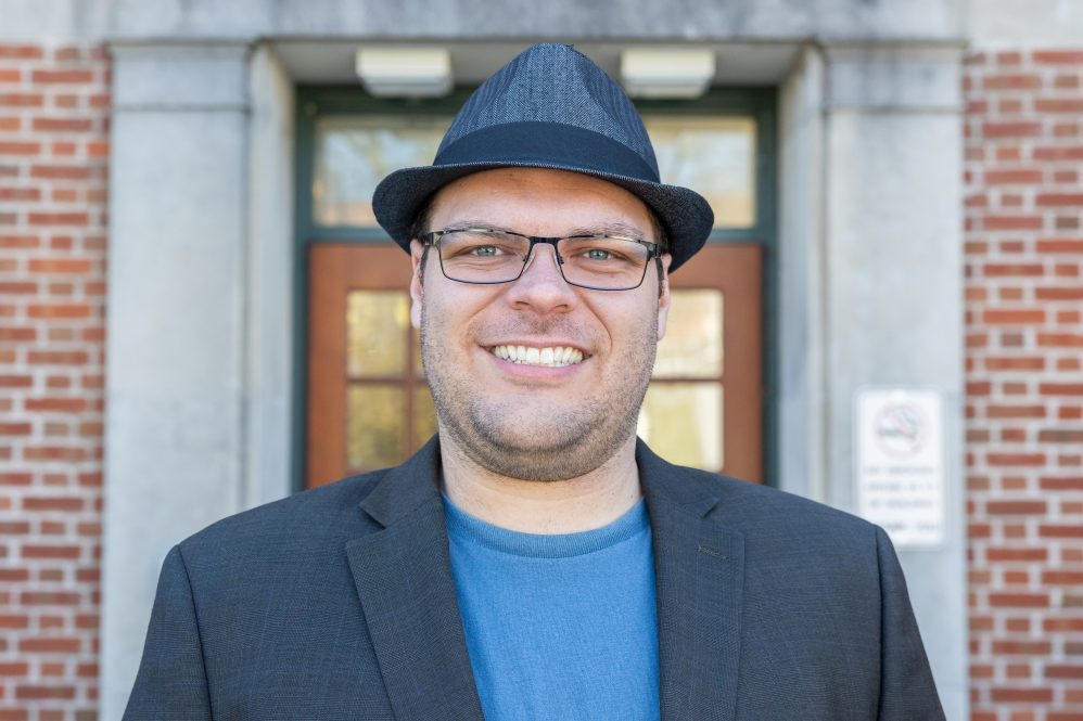 William Hiers '24 poses for a photo outside Young Building