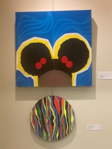 "Power Puffs," top, and "Untitled" by Brea Thomas-Young '19 (SFA) are on display as part of the "Symphony of Colors" exhibition at the Ferguson Library near UConn Stamford. The show was curated by Isabella Montenegro '19 (SFA)