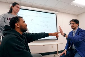 Physical Therapy students work with professor