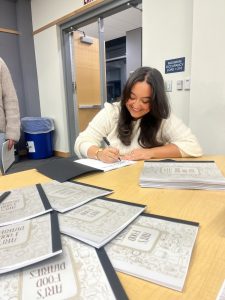 Arianna Melendez Cintron '24 (CAHNR) produced a Mediterranean-style cookbook for UConn students through her participation in the BOLD Women's Leadership Program at UConn. She presented her project and autographed copies for attendees at a launch event.
