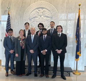 UConn team and Federal Reserve Chairman Jerome Powell