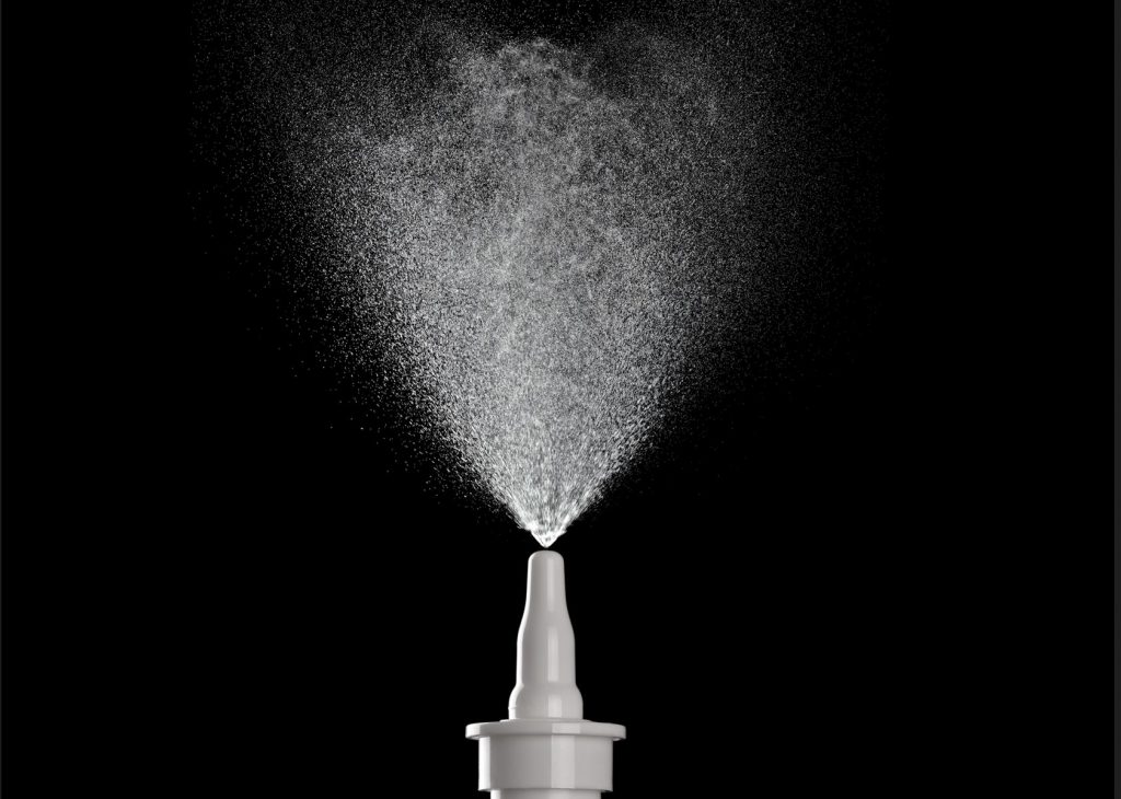Close up of nasal spray being sprayed