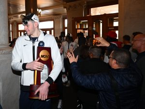 The UConn men arrive at the Capitol with the NCAA championship trophy (UConn Athletics Photo).