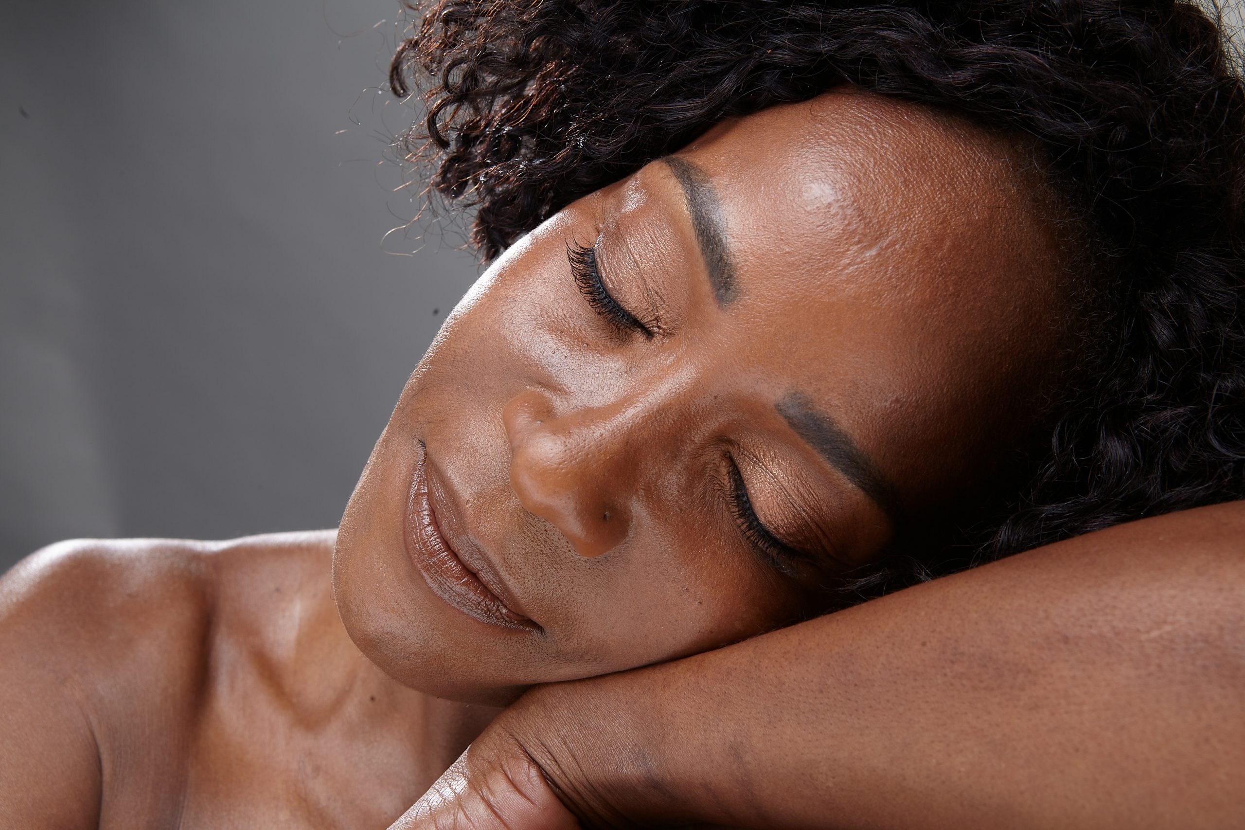 Closeup of a woman sleeping.