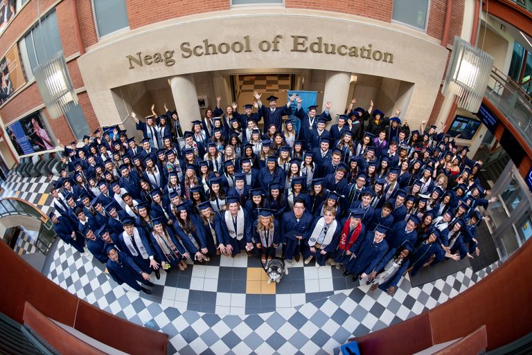 Neag School of Education Class of 2023 graduates in the Gentry Building atrium