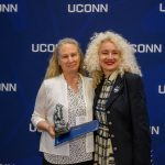 Susan Corbin receives the Unsung Hero award from President Radenka Maric during the Spirit Awards ceremony.