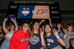 UConn students cheer on the men's basketball team from Gampel Pavilion.