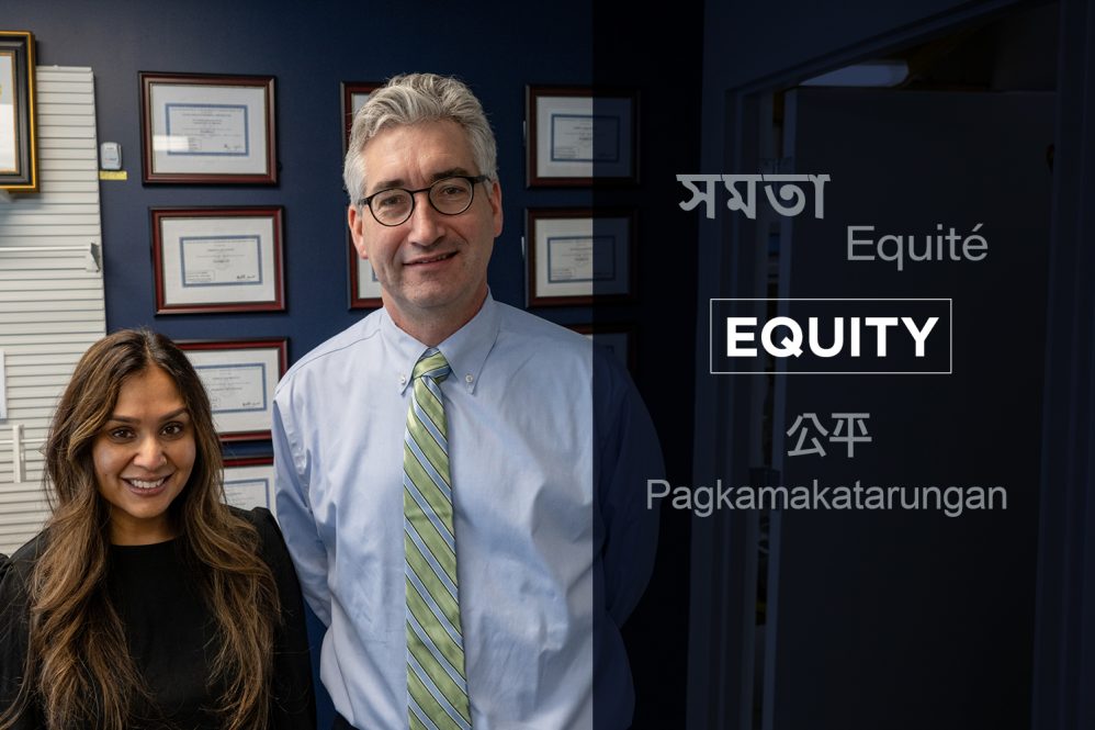 Portrait of Dr. Hetal Patel and Emmett Sullivan in pharmacy reception area