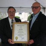 Dean Kerr receiving an official citation from the CT General Assembly at a CAHNR event.