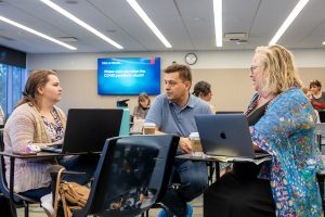 Participants of the Summer Seminar for Genocide Studies and Prevention engage in discussion during a session