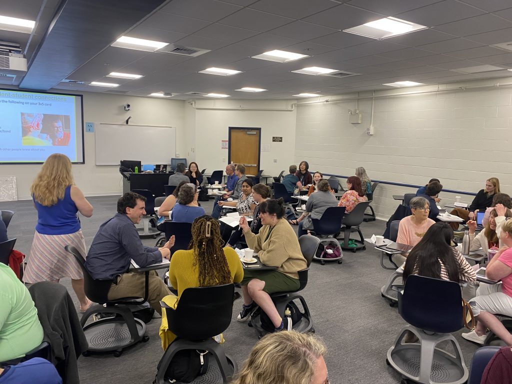 Students, faculty, and staff together at a conference.